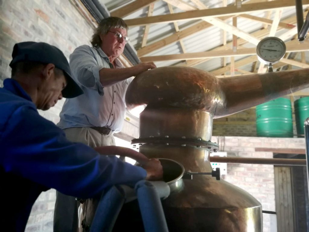 1st Principles owner, founder and distiller Joubert Roux demonstrating how to use his copper distiller with the assistance of a colleague.
