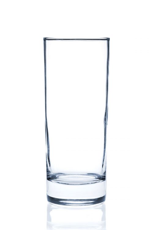 A clear Collins glass against a transparent background.