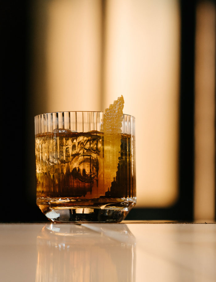 A Vieux Carré Cocktail in an ornamental tumbler glass.